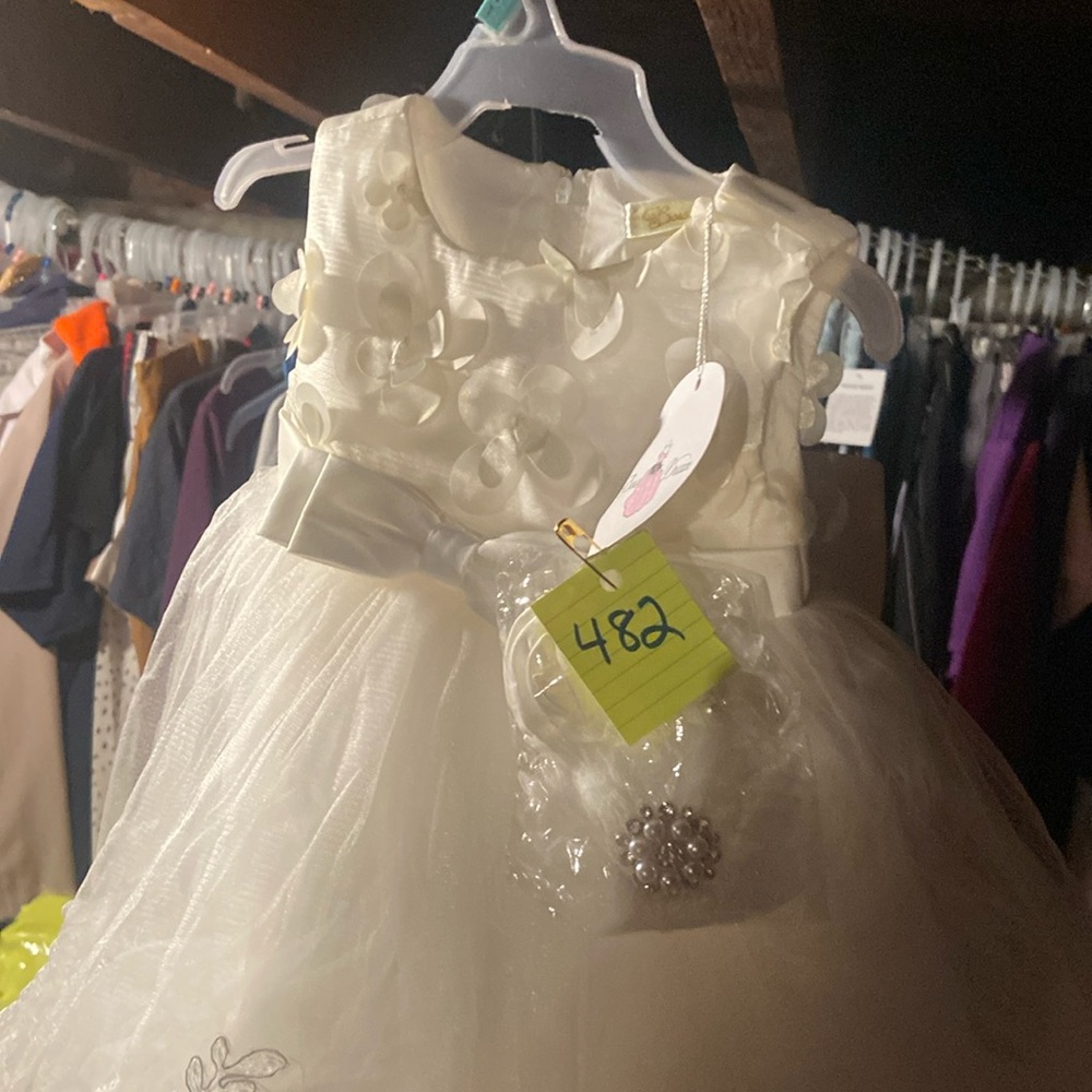 #482 girls dress white bows and dreams size 6 to 12 months new with tags.